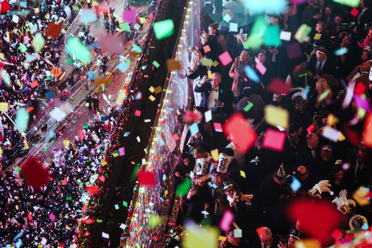 Confetti falls over Times Square. Heather Khalifa/AP