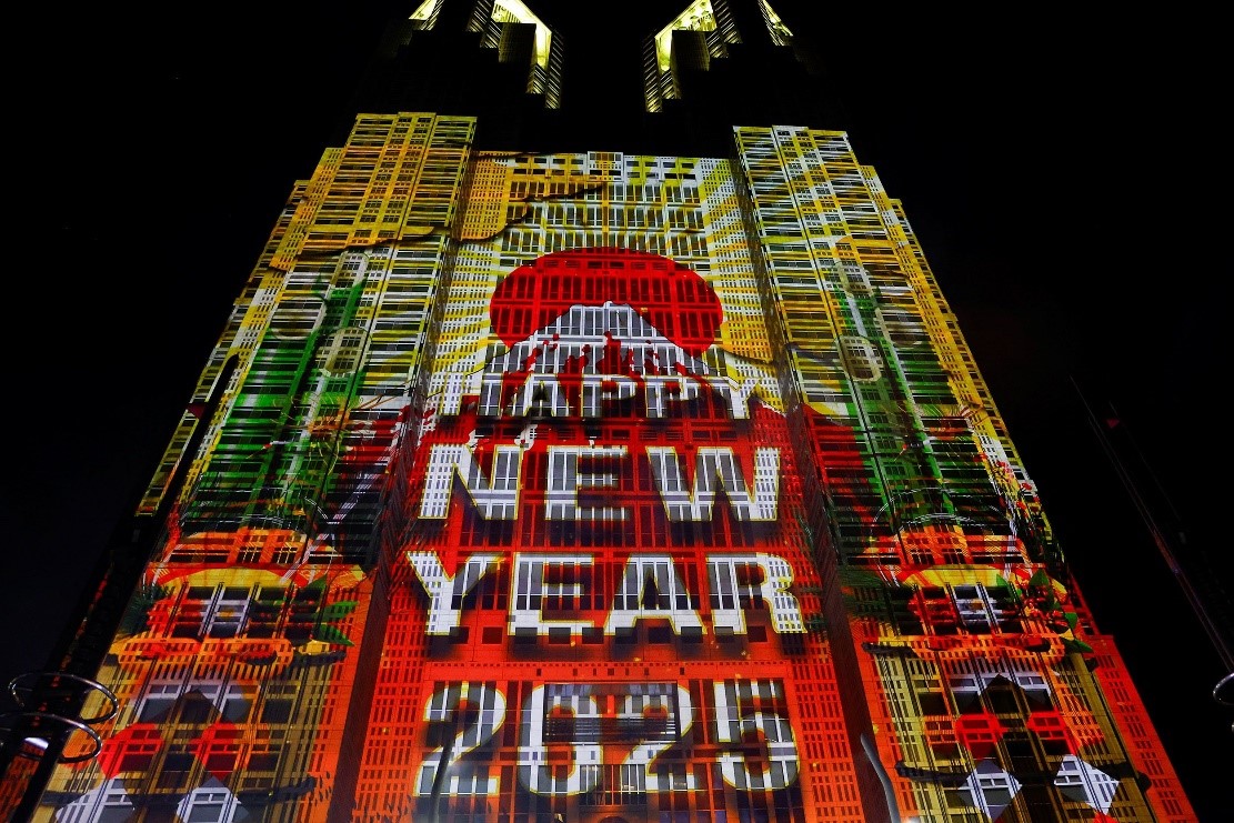 A New Year's message is projected onto the surface of the Tokyo Metropolitan Government Building. Kim Kyung-Hoon/Reuters