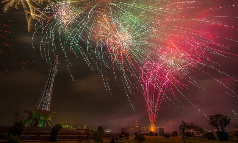 Fireworks explode over the Minar-e-Pakistan. Photo via Social Media