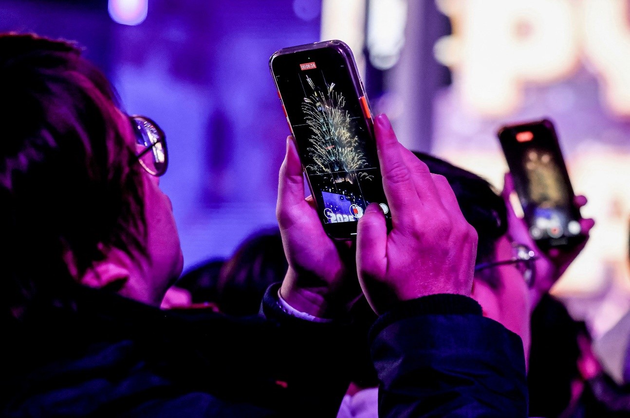 People take video of fireworks from the Taipei 101 building in Taiwan. I-Hwa Cheng/AFP/Getty Images